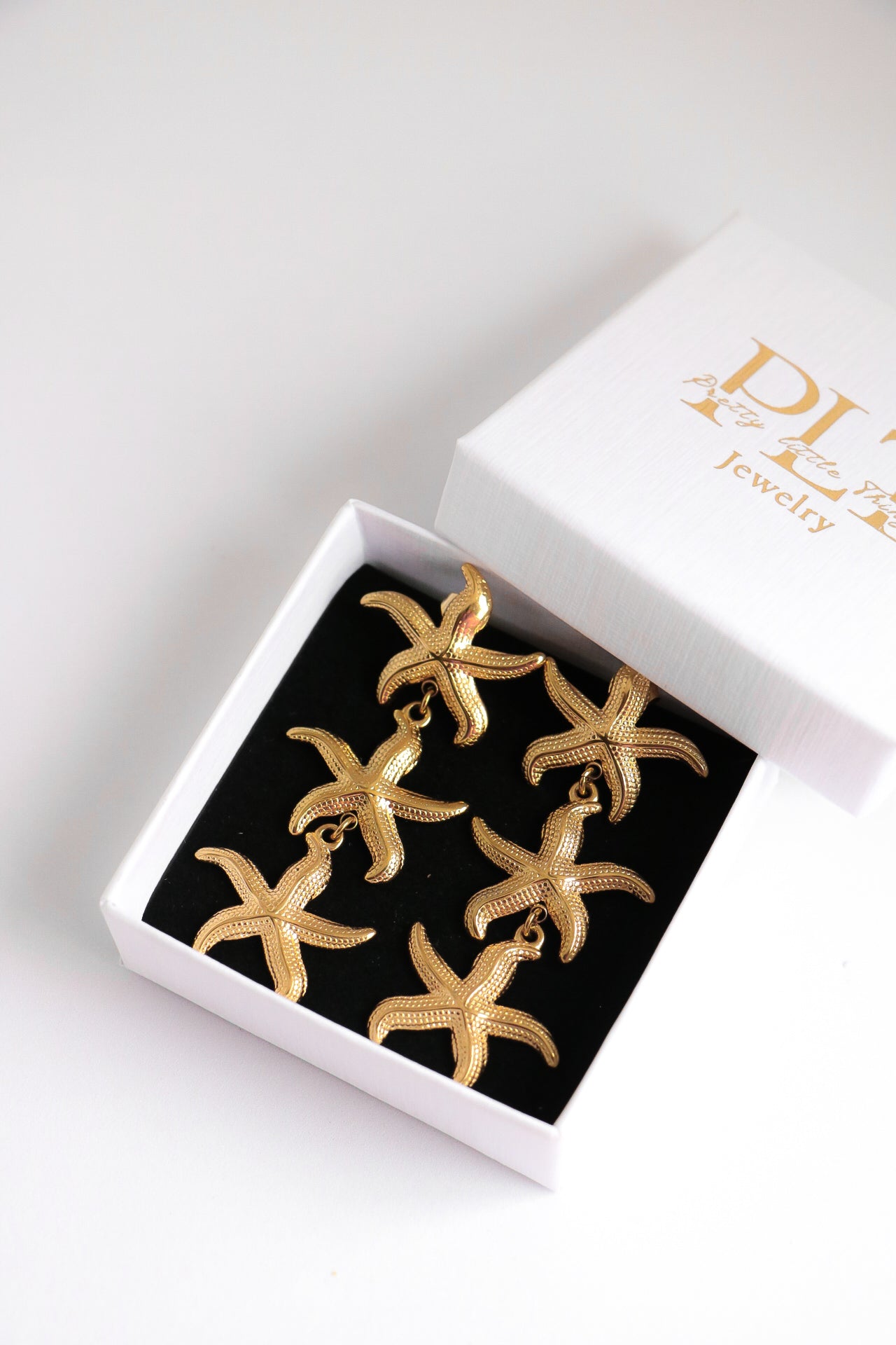 BRINCOS STARFISH
